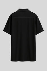 Back view of black short sleeve shirt with white stitching, luxury fashion by Sailuc