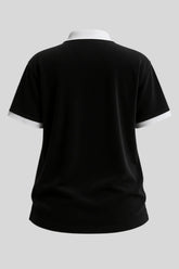 Back view of black Sailuc polo shirt with white collar and sleeve cuffs on gray background