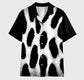 leopard patterned shirt on a gray background