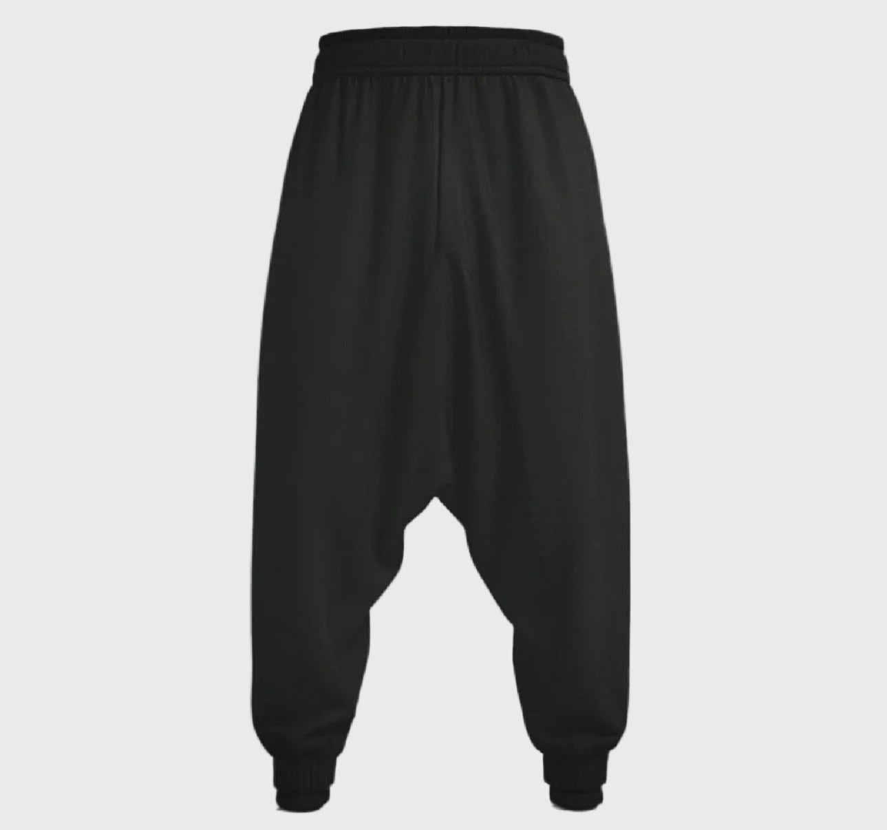 Black harem pants on a gray background