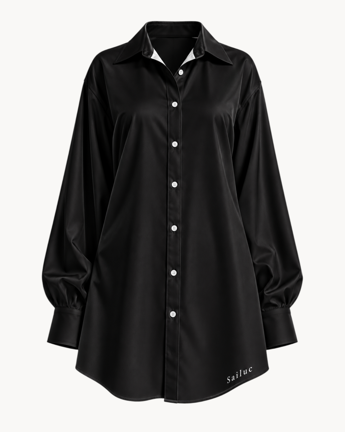 Sailuc Linea longline shirt in black with a classic collar, button-down front, and white stitching details.