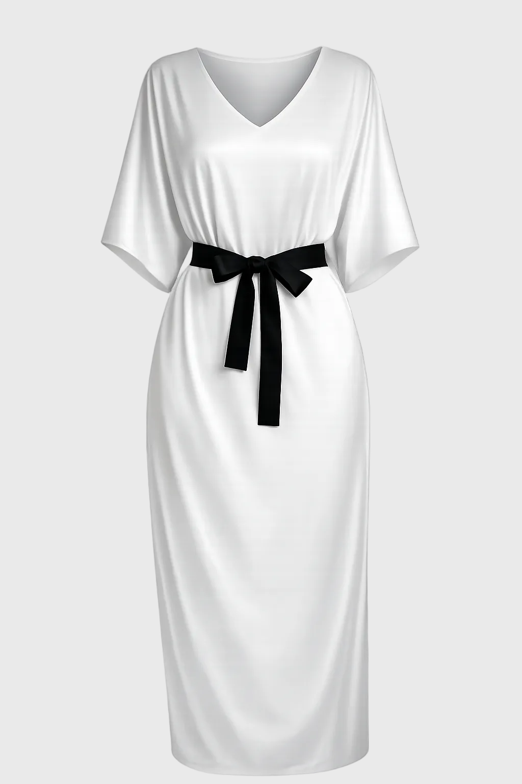 White dress with a black belt on a gray background