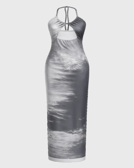 Gray halter neck dress with a pattern on a gray background