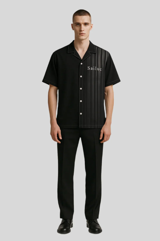 Man modeling Sailuc luxury black short-sleeve shirt and trousers, modern fashion style