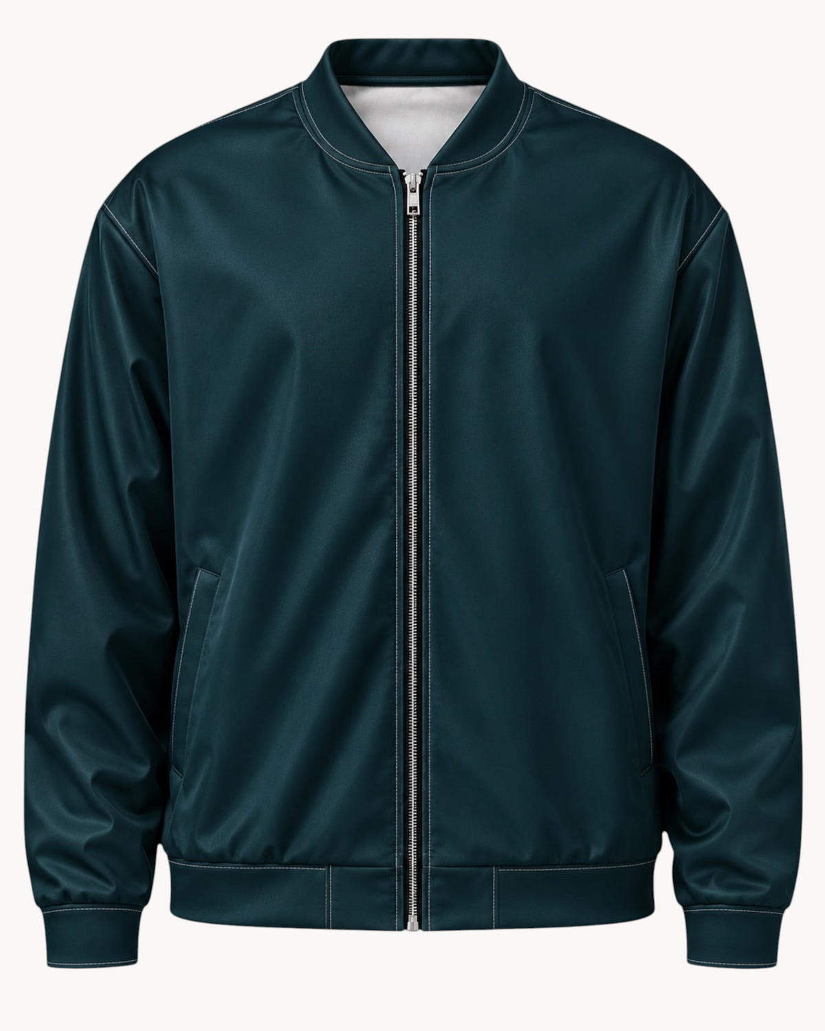 Sailuc Vesper bomber jacket in dark teal with a silver YKK zipper, ribbed collar, and soft brushed fleece interior.