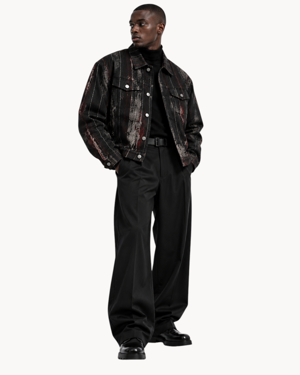 A model wearing a Sailuc Strata collared jacket with a distressed black and red pattern over a black turtleneck.