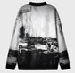 Black and white abstract patterned shirt on a gray background