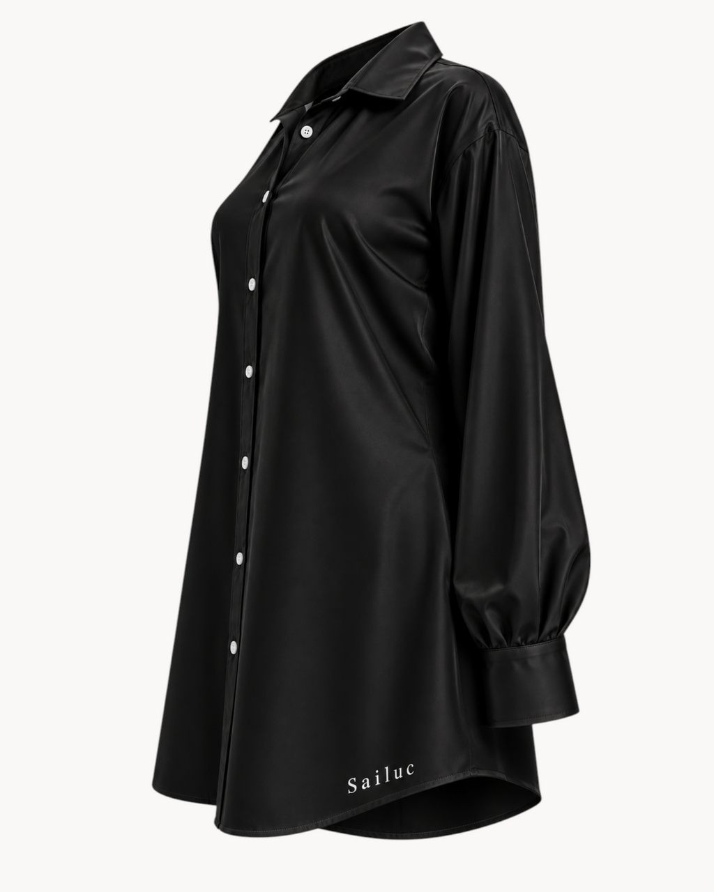 Sailuc Linea longline shirt in black with a classic collar, button-down front, and long sleeves in a soft fabric.