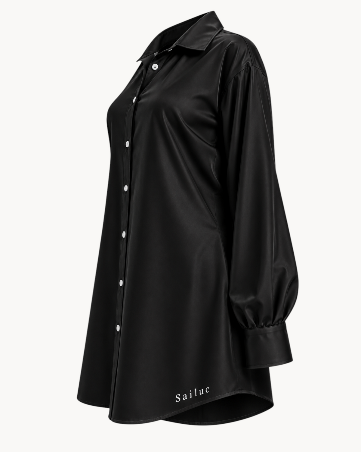 Sailuc Linea longline shirt in black with a classic collar, button-down front, and long sleeves in a soft fabric.
