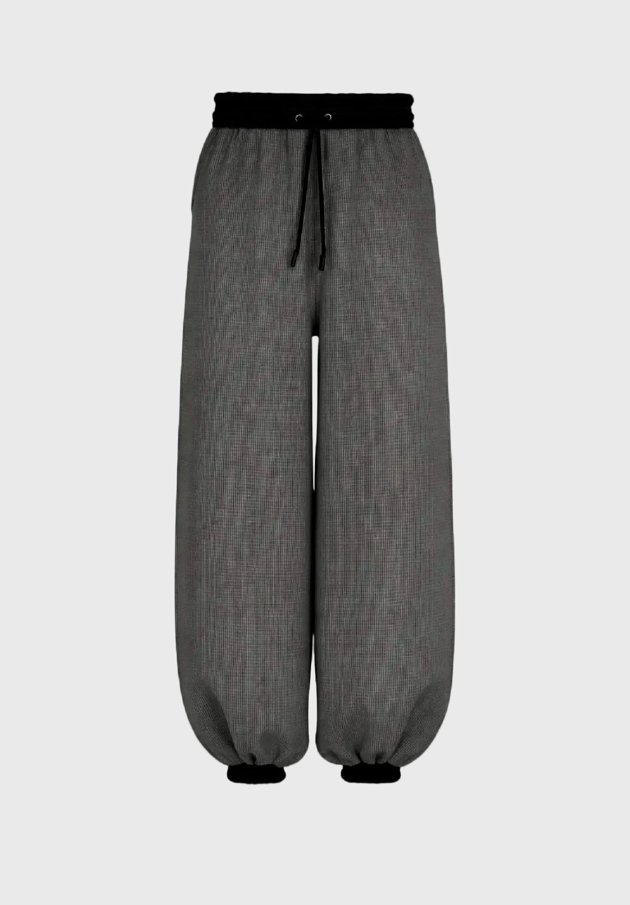 Gray pants with a black waistband and drawstring on a gray background