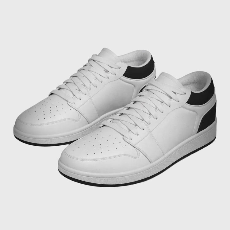 White sneakers with black accents on a gray background