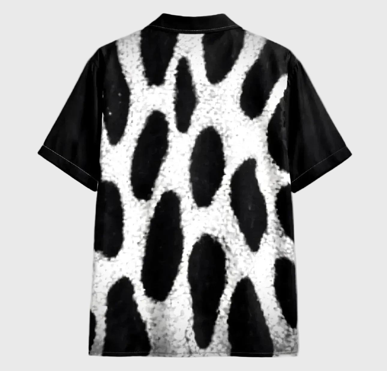 leopard patterned shirt on a gray background