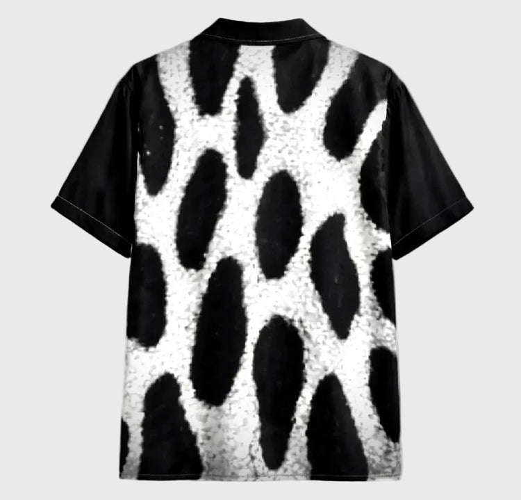 leopard patterned shirt on a gray background