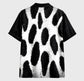 leopard patterned shirt on a gray background