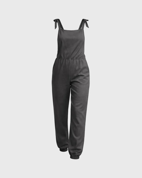 Gray jumpsuit on a gray background