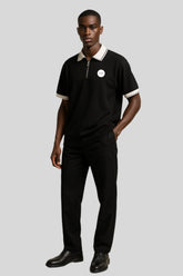 Man in Sailuc black polo shirt and pants, luxury men&