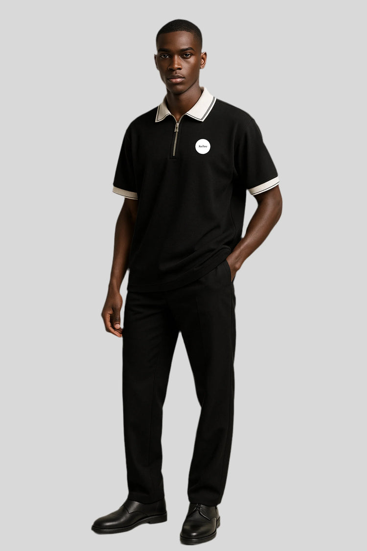 Man in Sailuc black polo shirt and pants, luxury men&