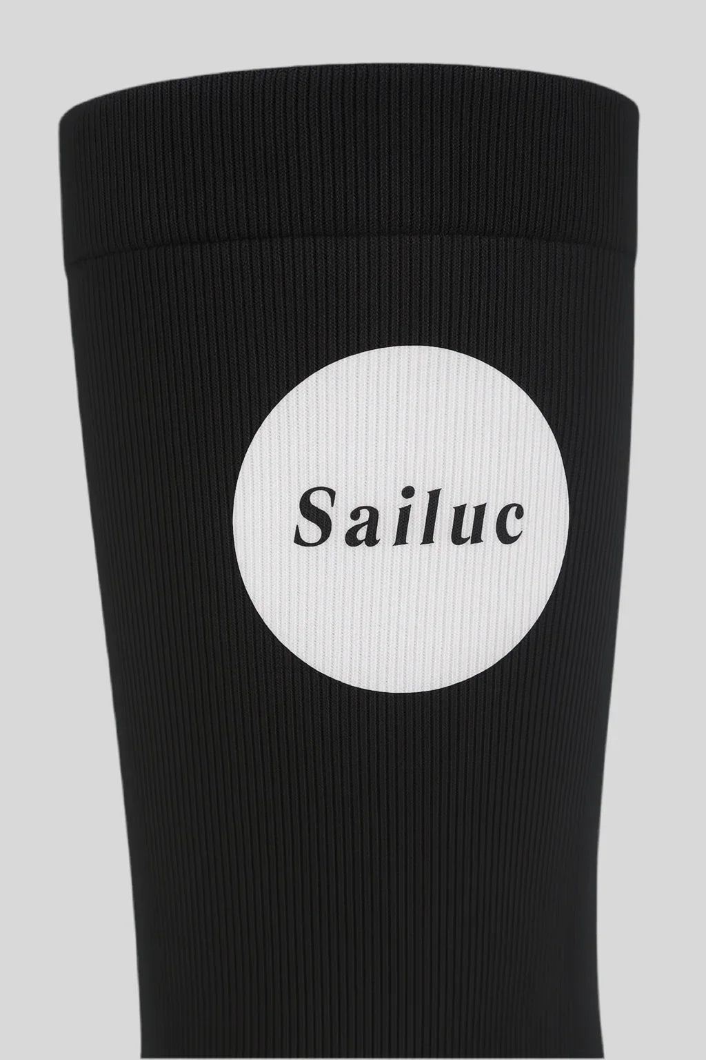Black ribbed Sailuc luxury fashion sleeve with white logo patch, minimalist design