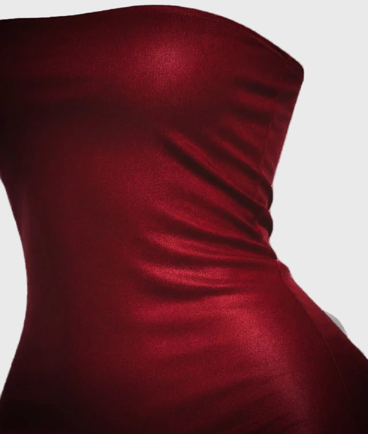 Red strapless dress on a gray background