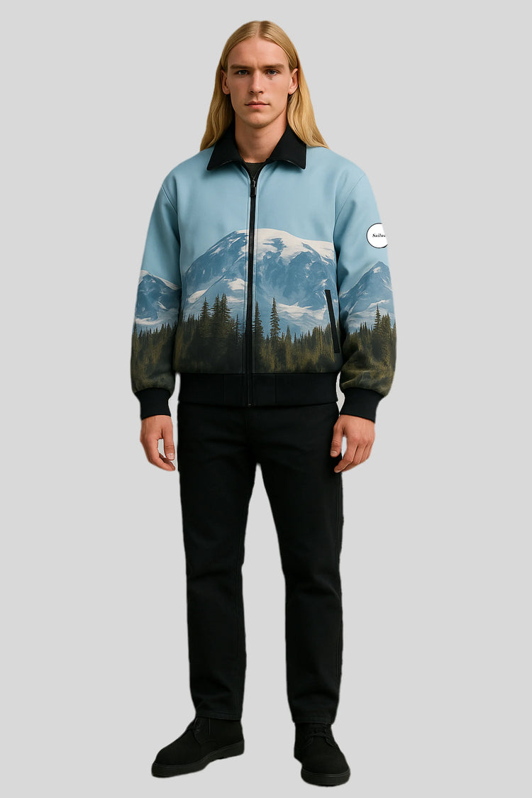 Man in Sailuc luxury mountain print jacket, black pants, black shoes on gray background.