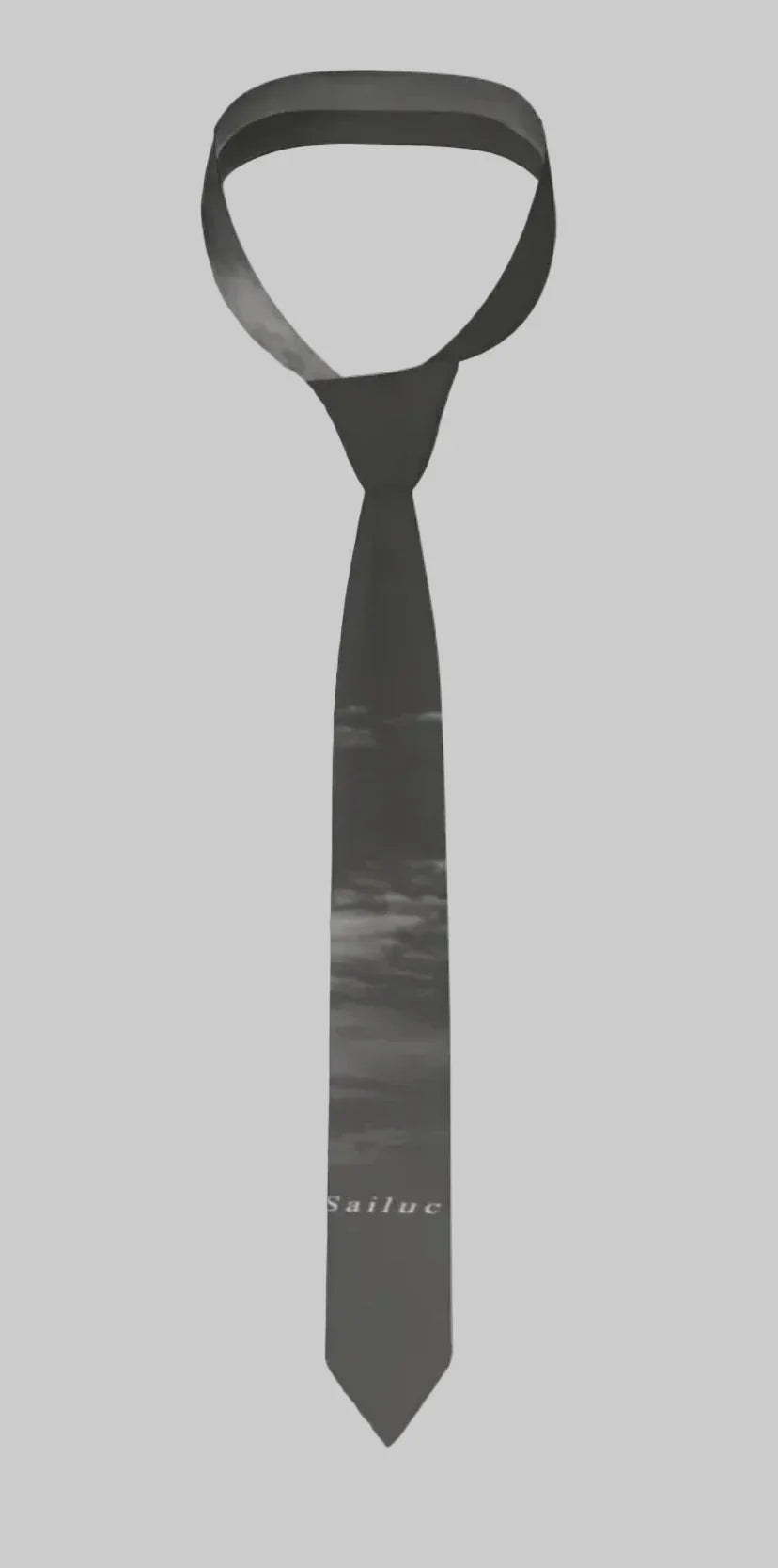 Sailuc luxury black tie with subtle sky pattern and white Sailuc branding, modern men&