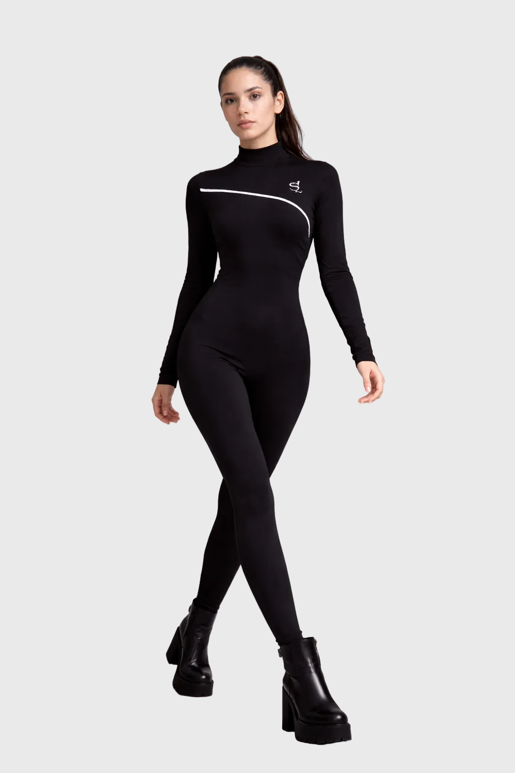 Person wearing a black bodysuit with white accents on a gray background