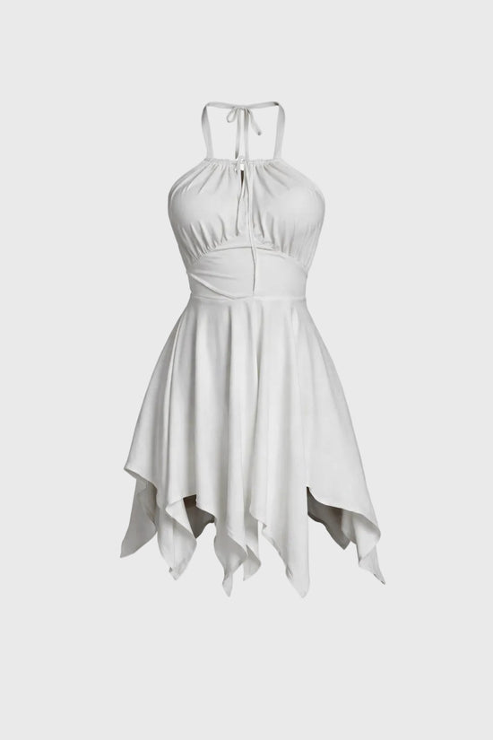 White dress with an asymmetrical hem on a light gray background