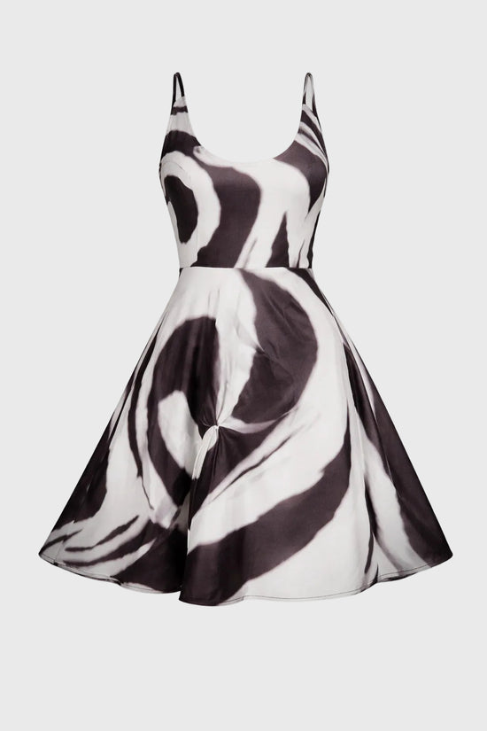 charcoal and white patterned dress on a gray background