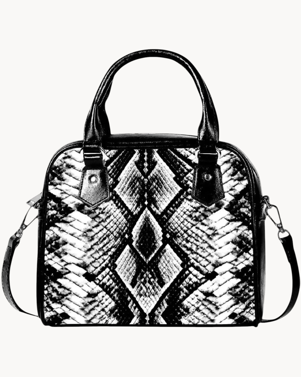 Black and white patterned handbag on a gray background