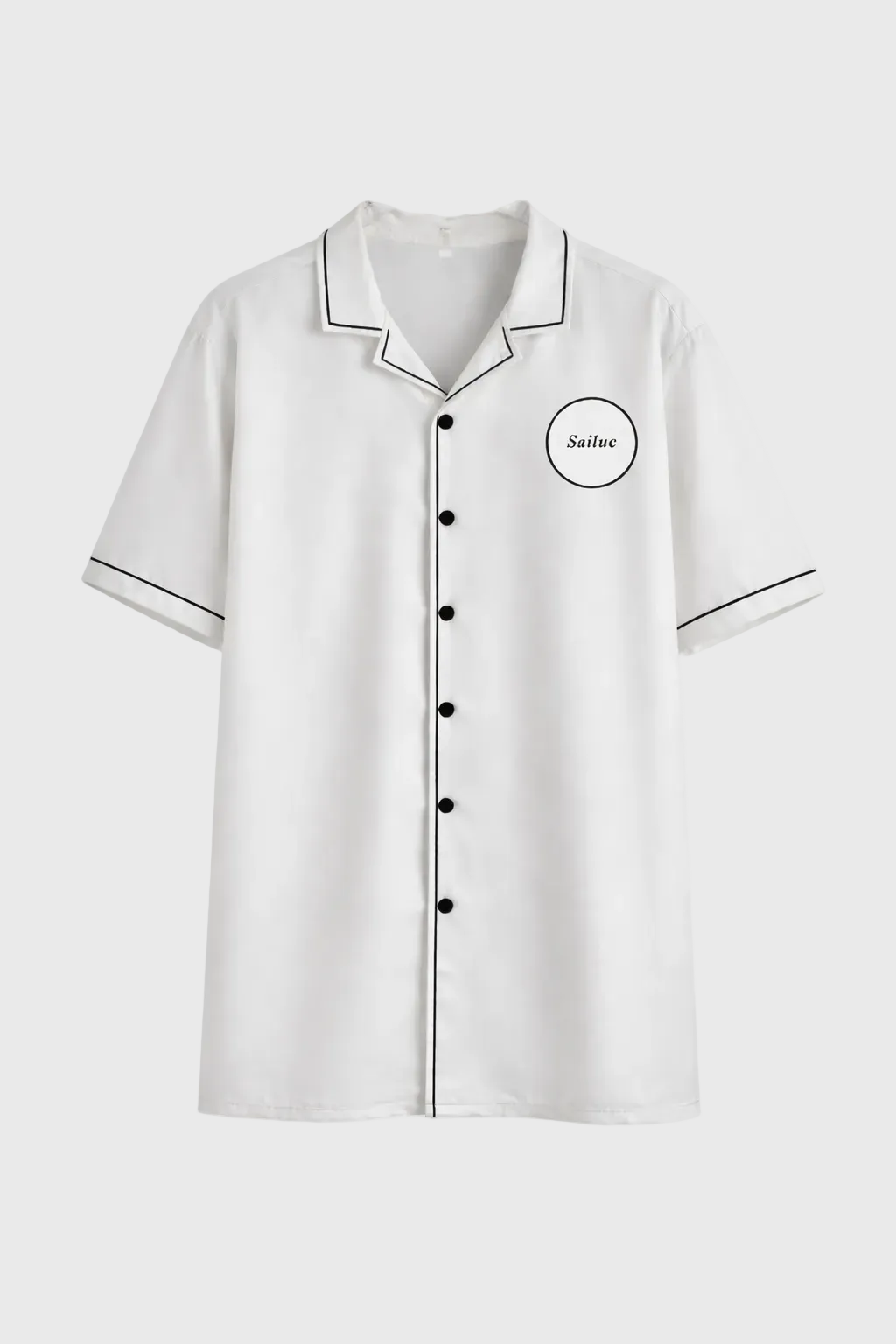 White shirt with black trim and branding on a gray background
