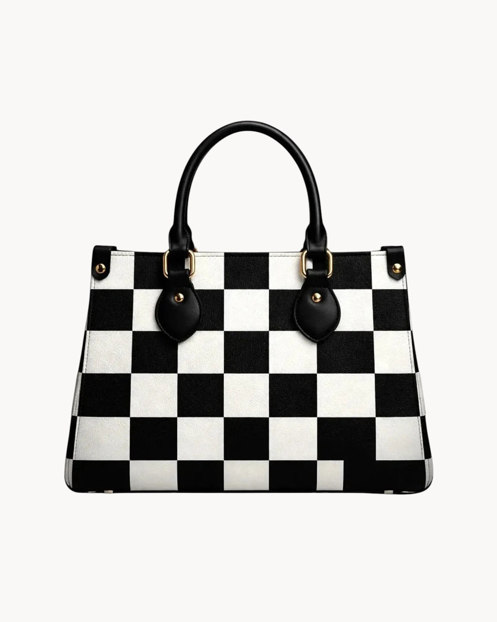 Black and white checkered handbag on a gray background