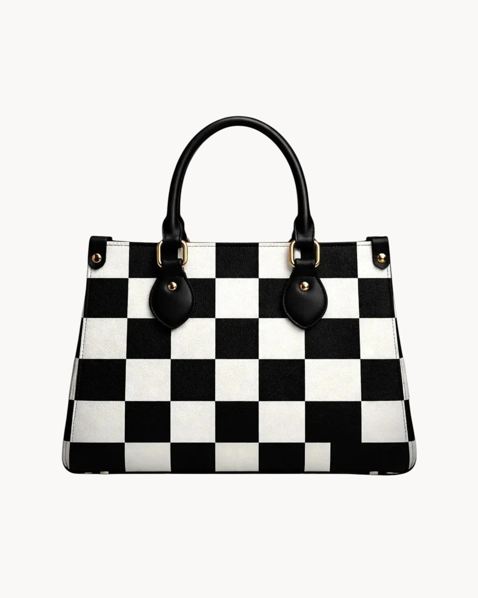 Black and white checkered handbag on a gray background