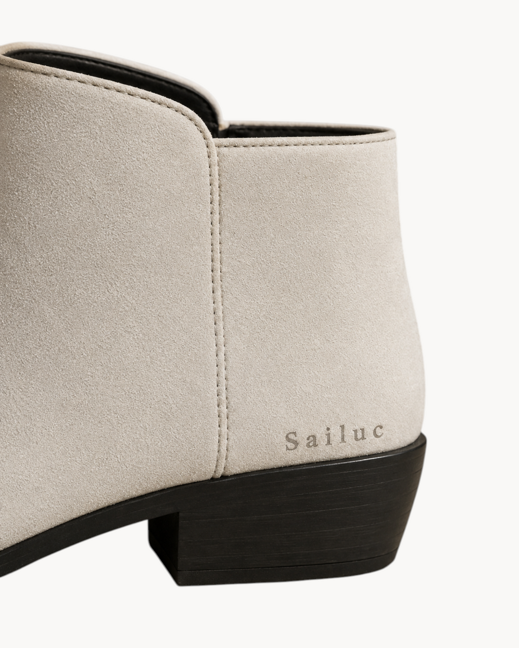 Sailuc ankle boots in beige technical suede with a matte finish, clean structured upper, and durable black heel.