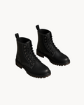 Sailuc Martin rugged style black combat boots with white contrast stitching, lace-up front, and durable lug soles.