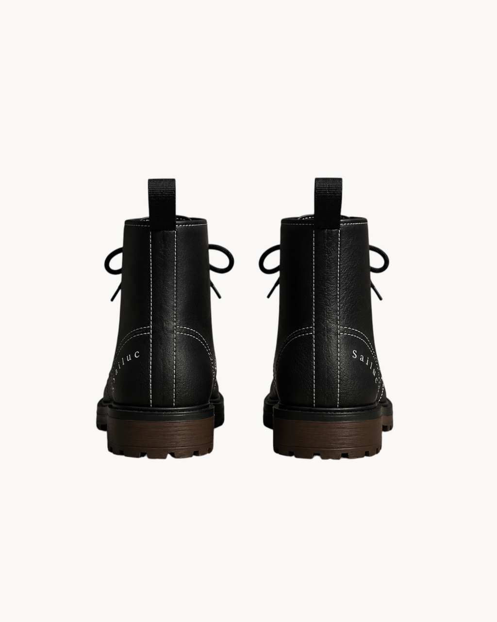 Rear view of Sailuc Martin Rugged Style black combat boots featuring white contrast stitching and brown lug soles.