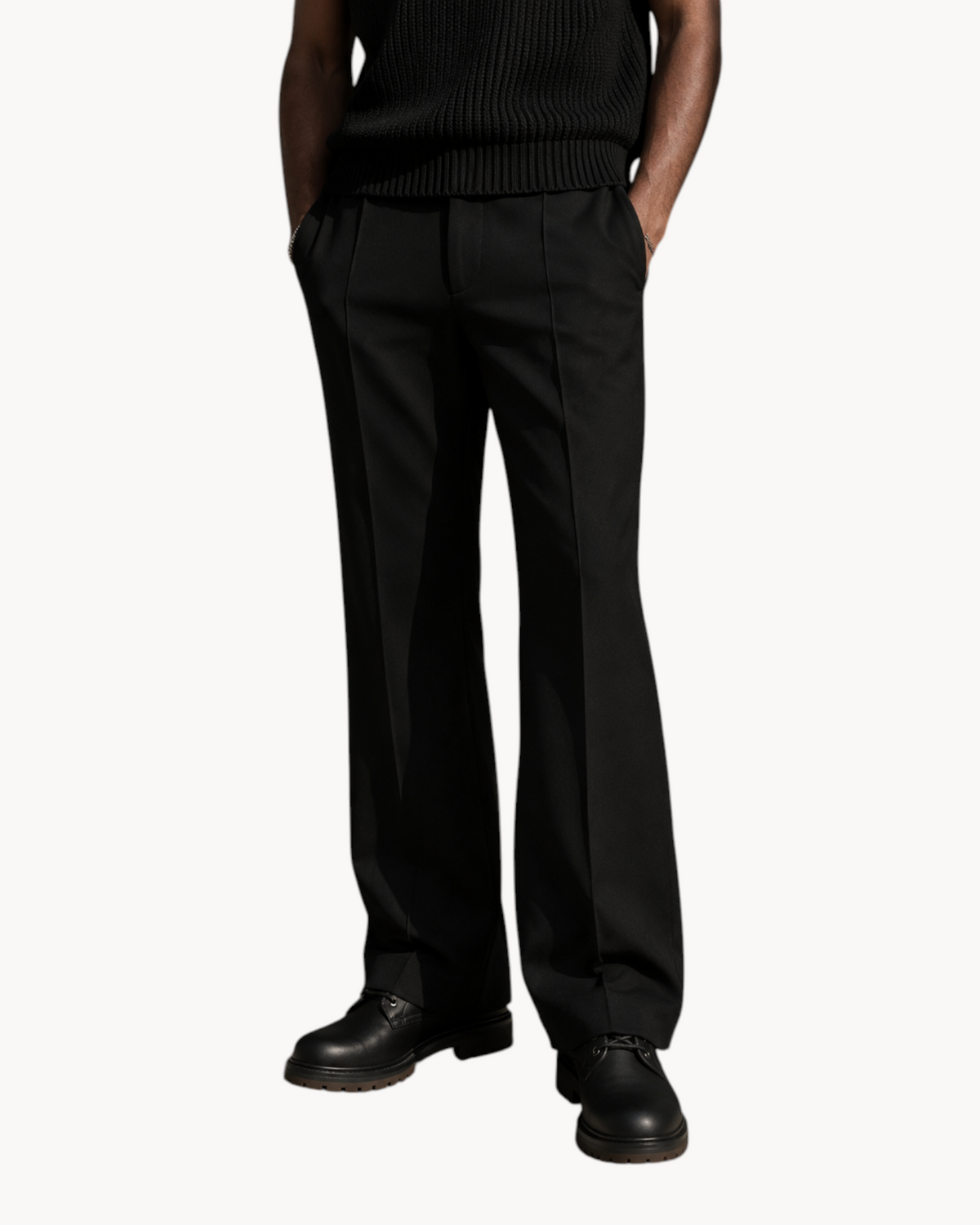 Sailuc Martin Rugged Style black lace-up combat boots worn with tailored trousers on a model