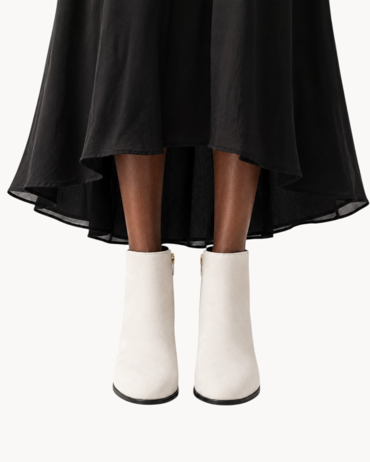 Sailuc ankle boots in off-white technical suede with a clean, matte finish and structured silhouette.