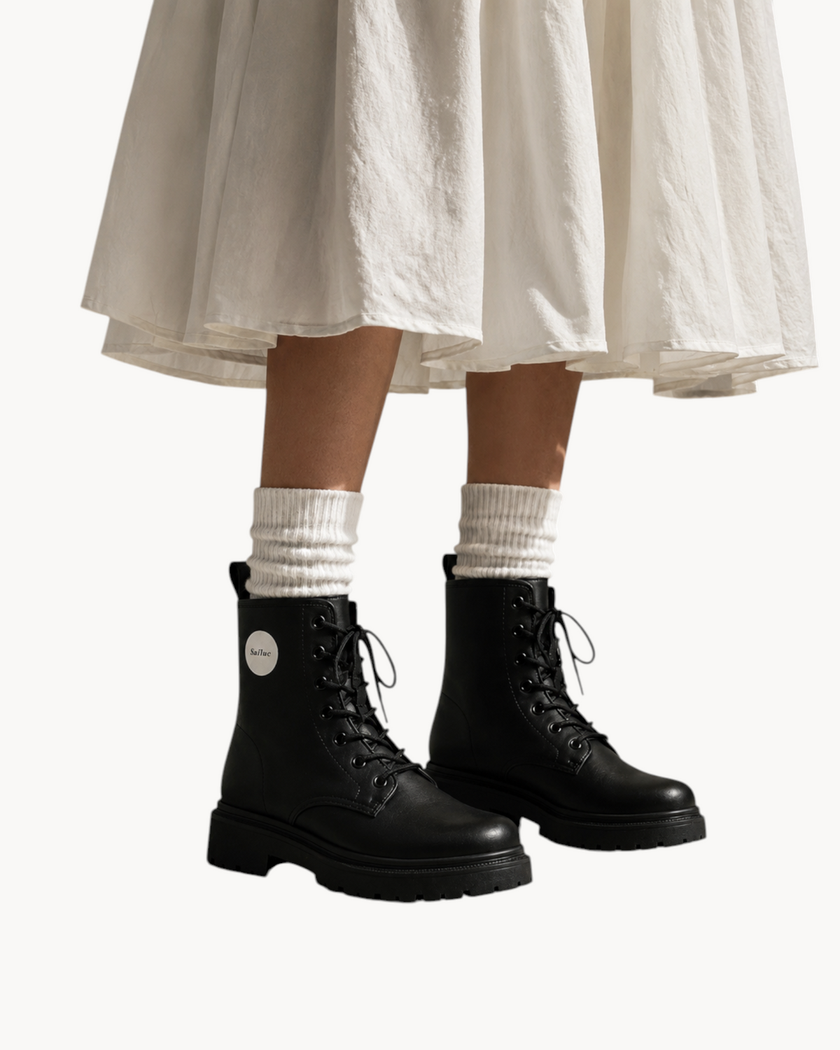 Sailuc Terrain Boots in black technical PU with a structured ankle-height silhouette and durable lug sole.