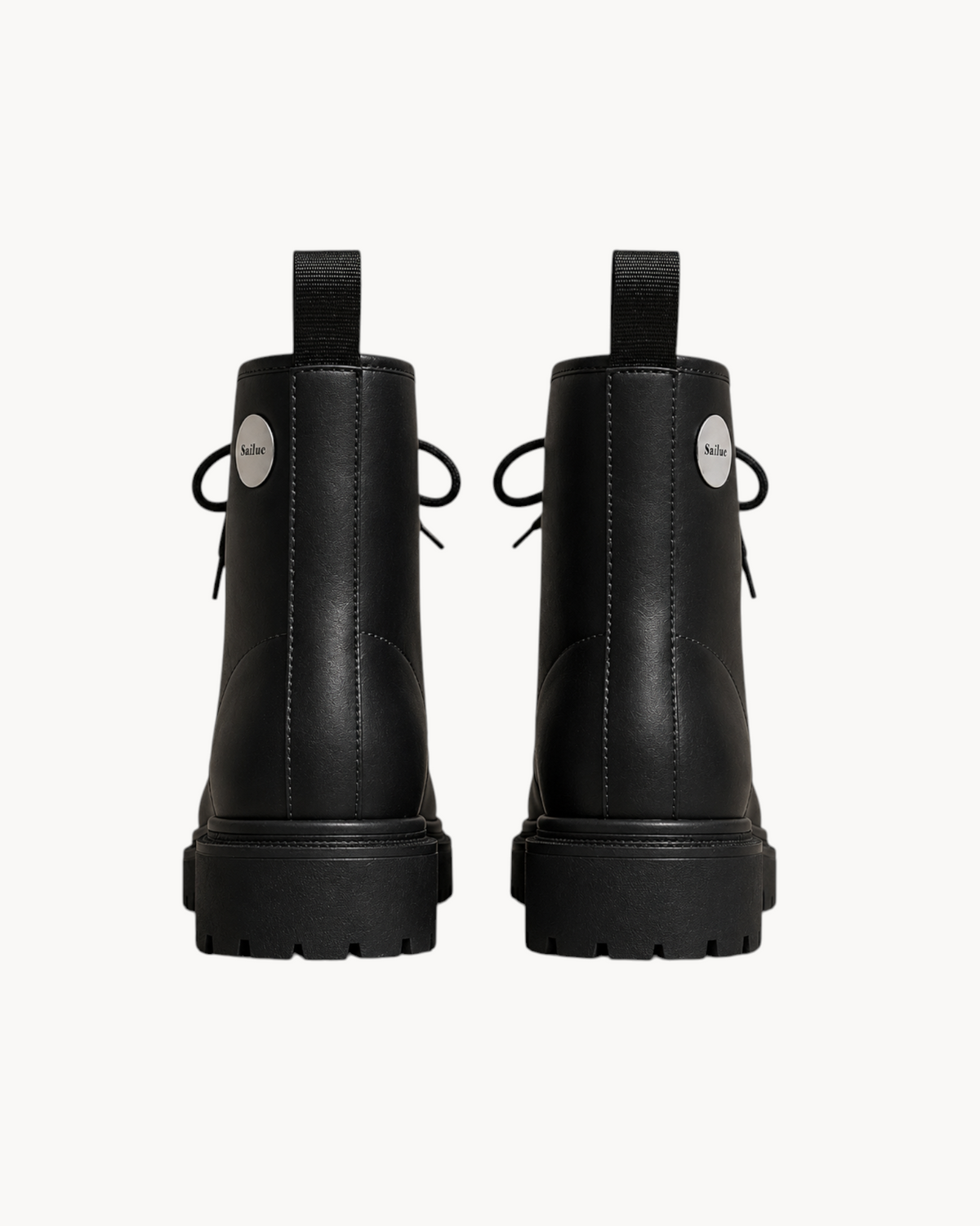 Sailuc Terrain Boots in black technical PU with a structured ankle-height silhouette and minimal seam detailing.